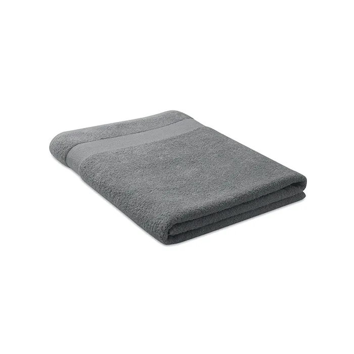 Gevouwen grijze organische handdoek van 180 x 100 cm