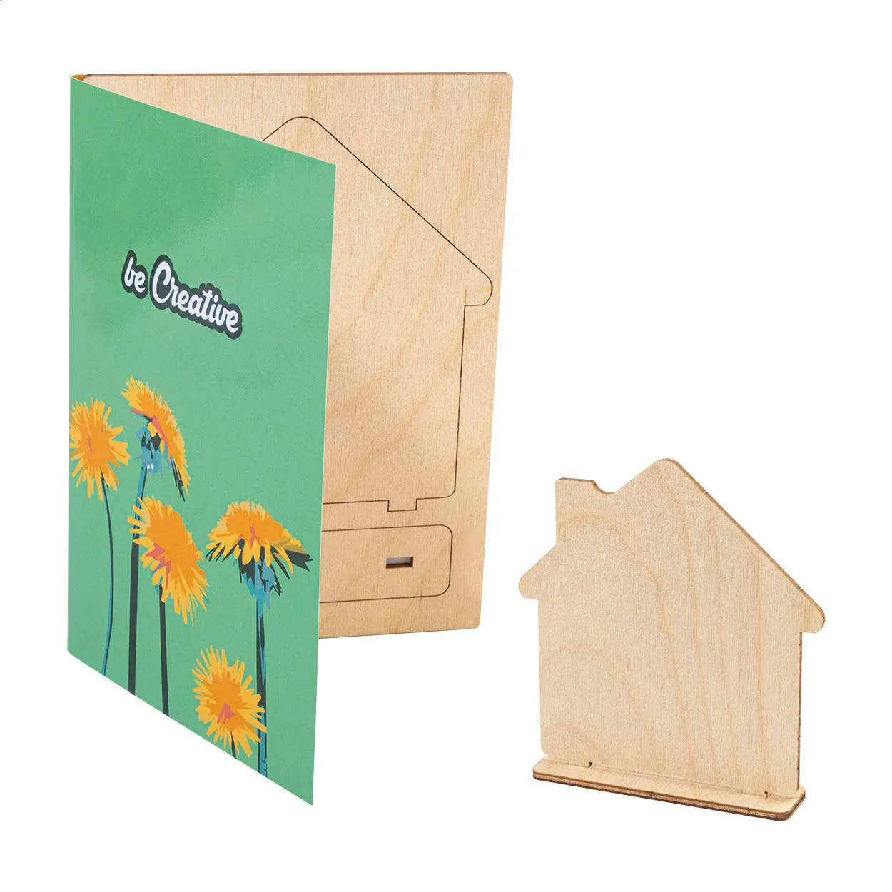 Houten puzzelansichtkaart met groene bloemenkaart en huisvormig puzzelstuk